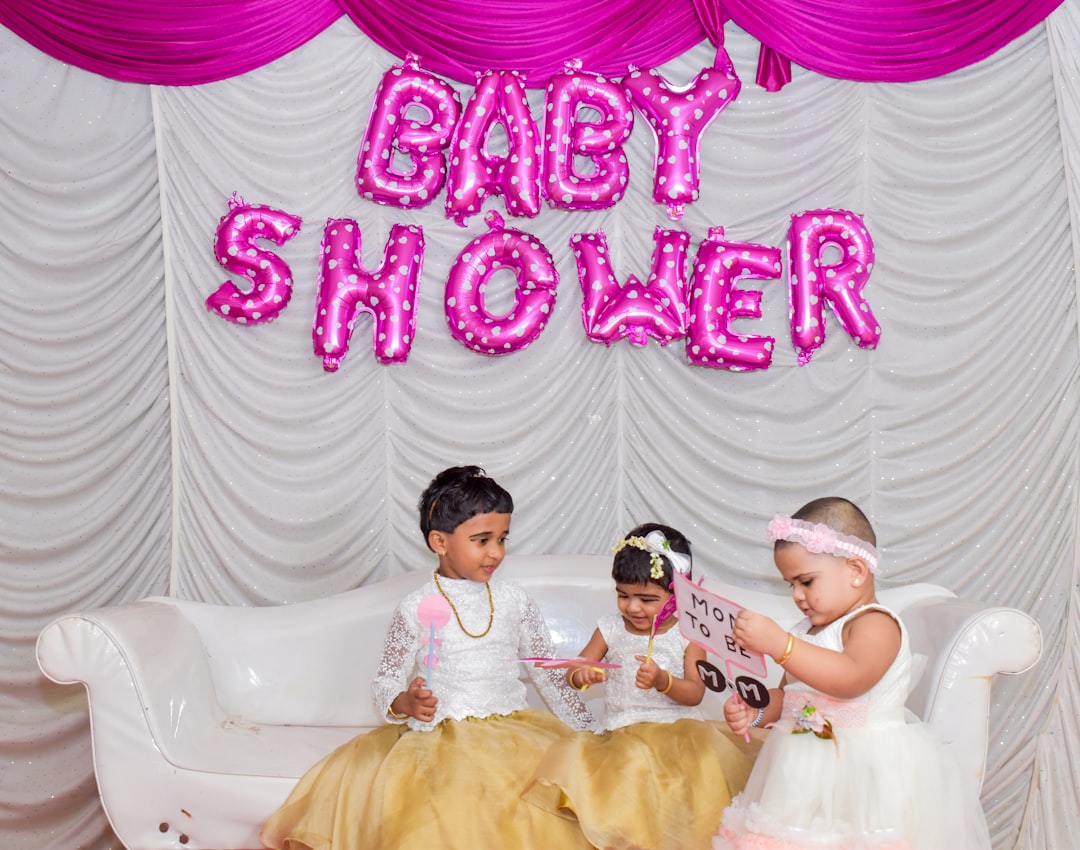 Colorful baby shower decorations with balloons and banners for boys, girls, and neutral themes.