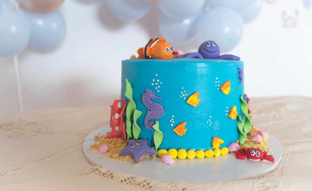 A colorful and festive kids theme party setup with balloons, decorations, and playful elements.